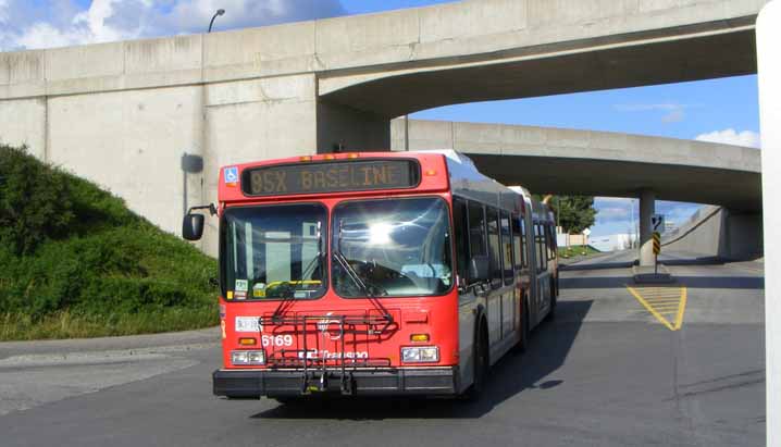 OC Transpo New Flyer D60LF articulated bus 6169 entering busway tunnel